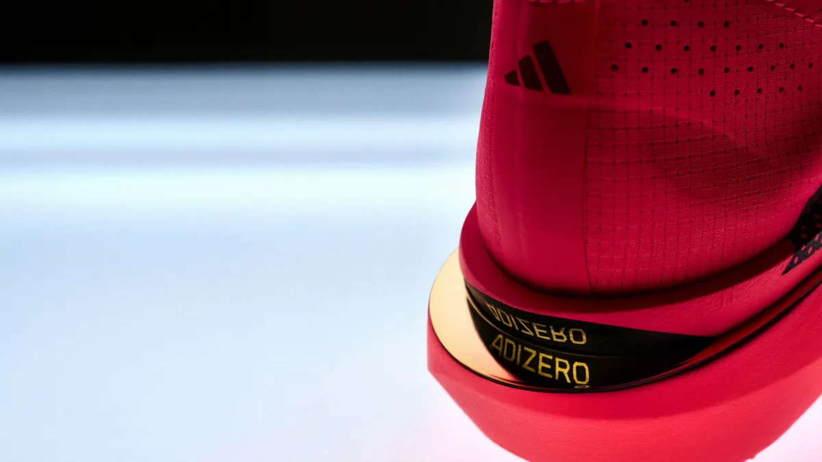Close-up of the Adizero Adios Pro 5 heel with Adizero branding
